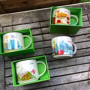 Starbucks collectible mugs. All four.